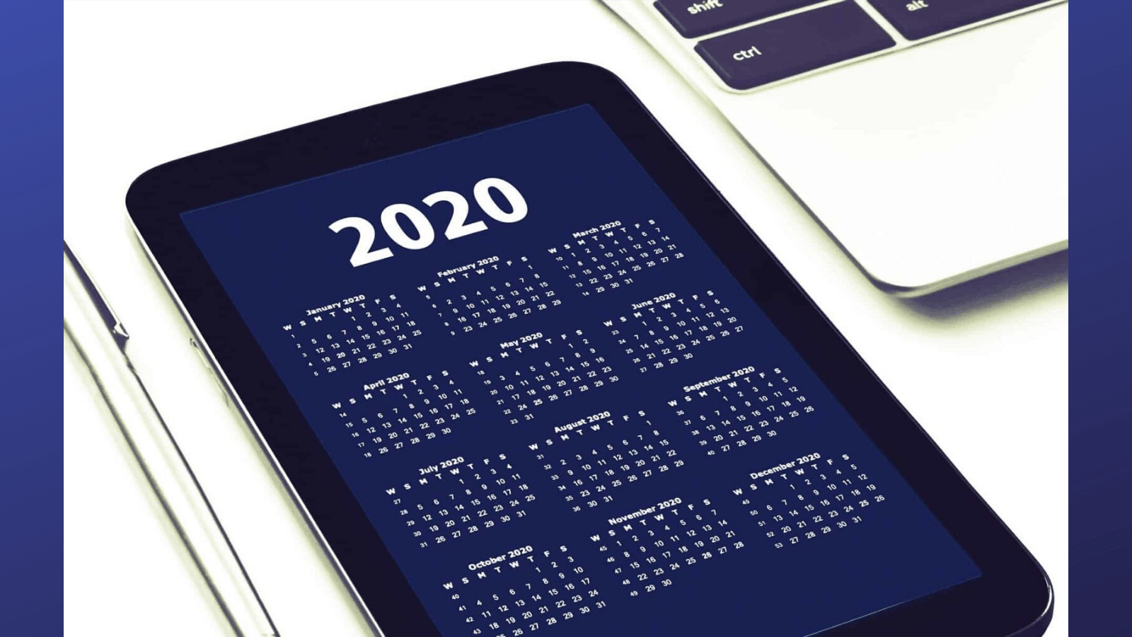 A photo of a mobile phone with the 2020 calendar displayed.