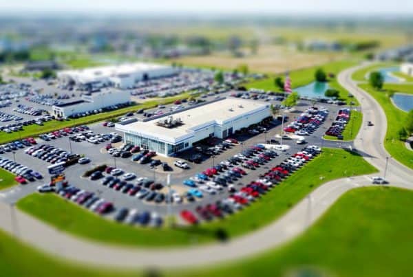 An aerial photograph looking over a car dealership.