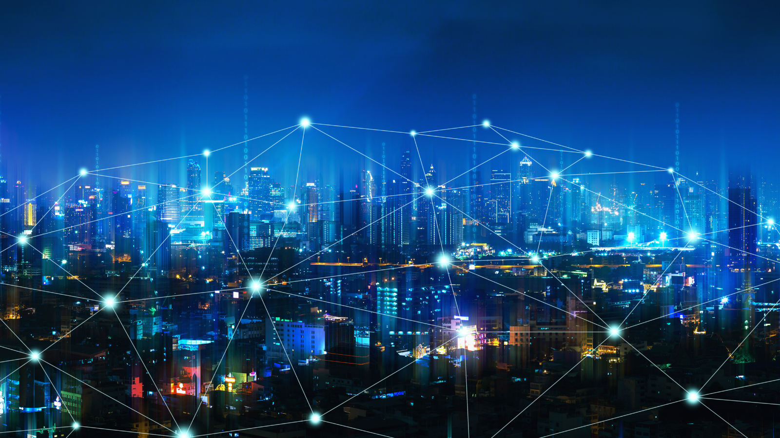 A graphic with a photo of a night time city skyline with an illustration portraying a network overlaid over top.