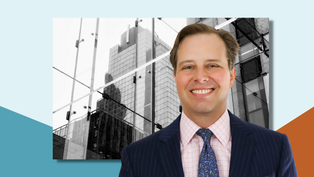 A photo of Justin Foa in front of a black & white photo of a NYC building.