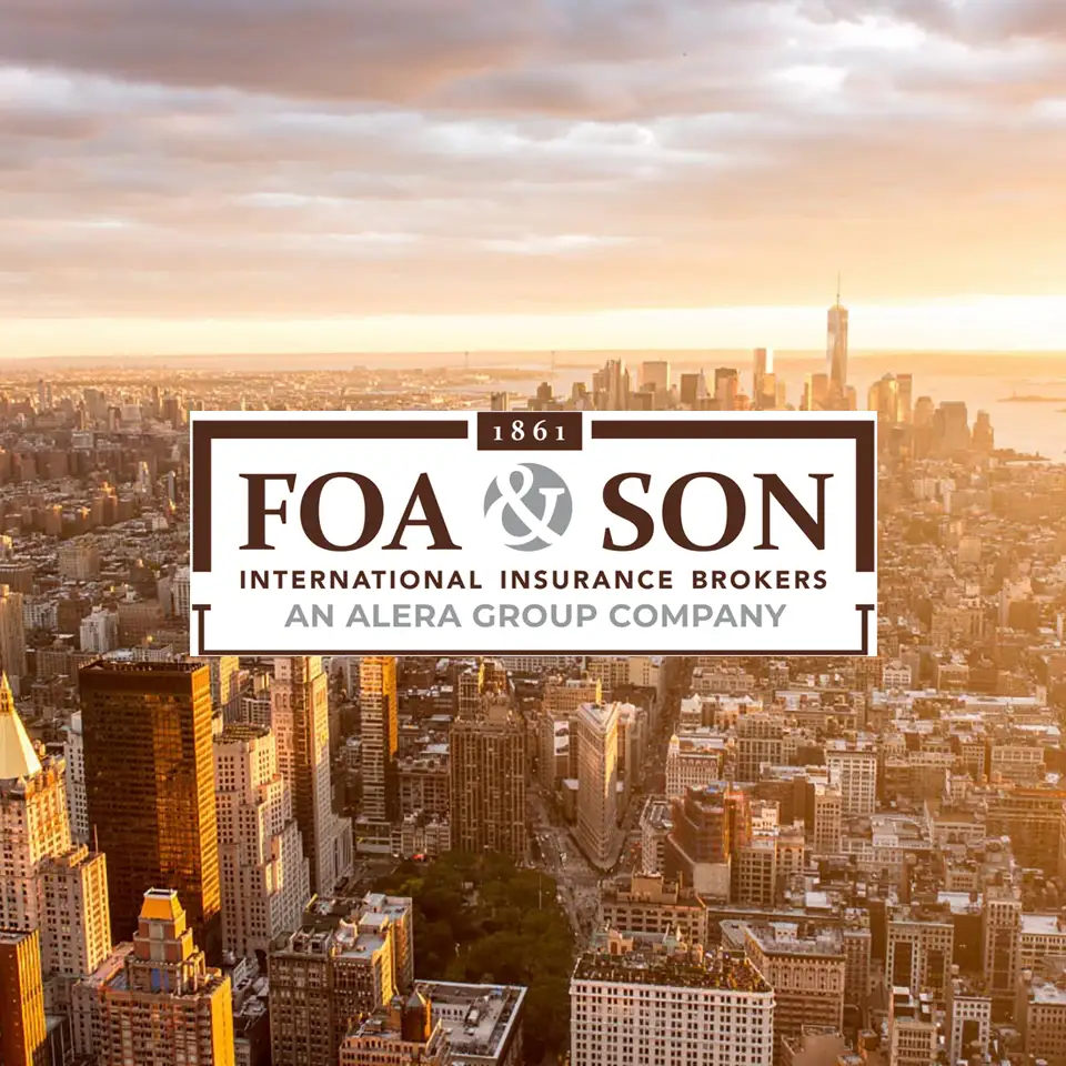 The Foa & Son Logo over an aerial view of New York City at sunrise or sunset.